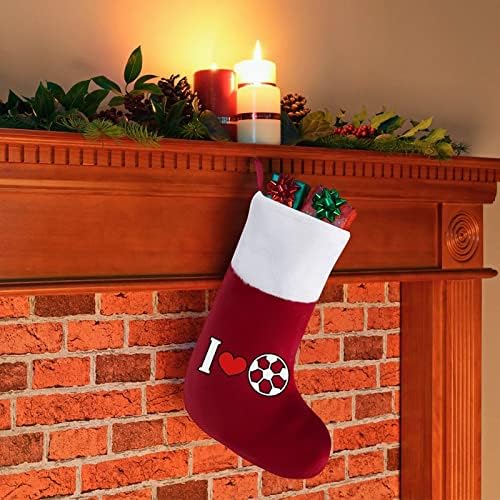 Loveубов фудбалски божиќни чорапи со порибување со кадифен камин што виси за Божиќно дрво
