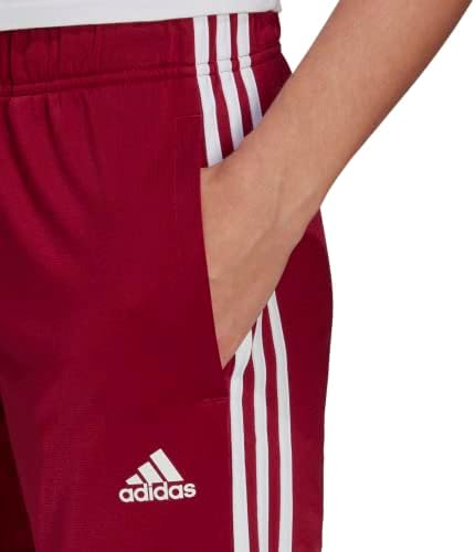 Adidas женски најважни работи на руно ги затегнаа панталоните за манжетни